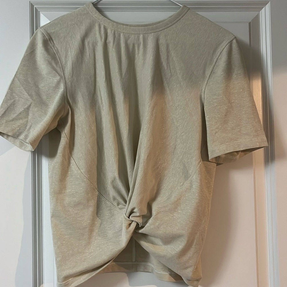 Crescent T-Shirt Gold shimmer Lululemon with bottom front knot.